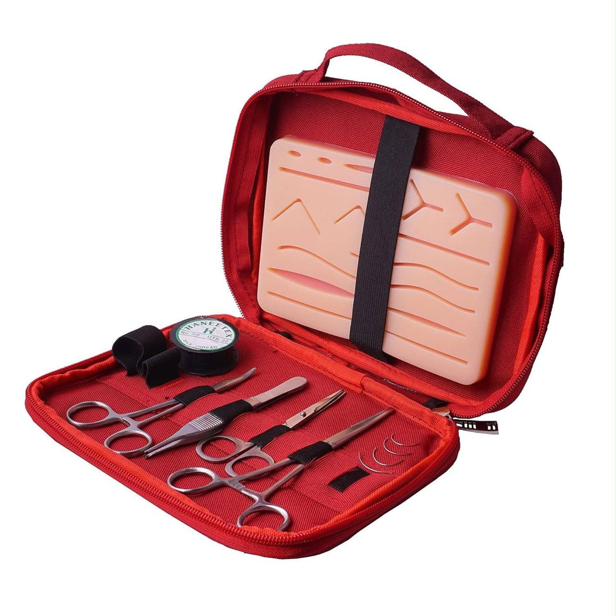 Medessens Suture Practice Kit opened showing silicone pad and surgical instruments