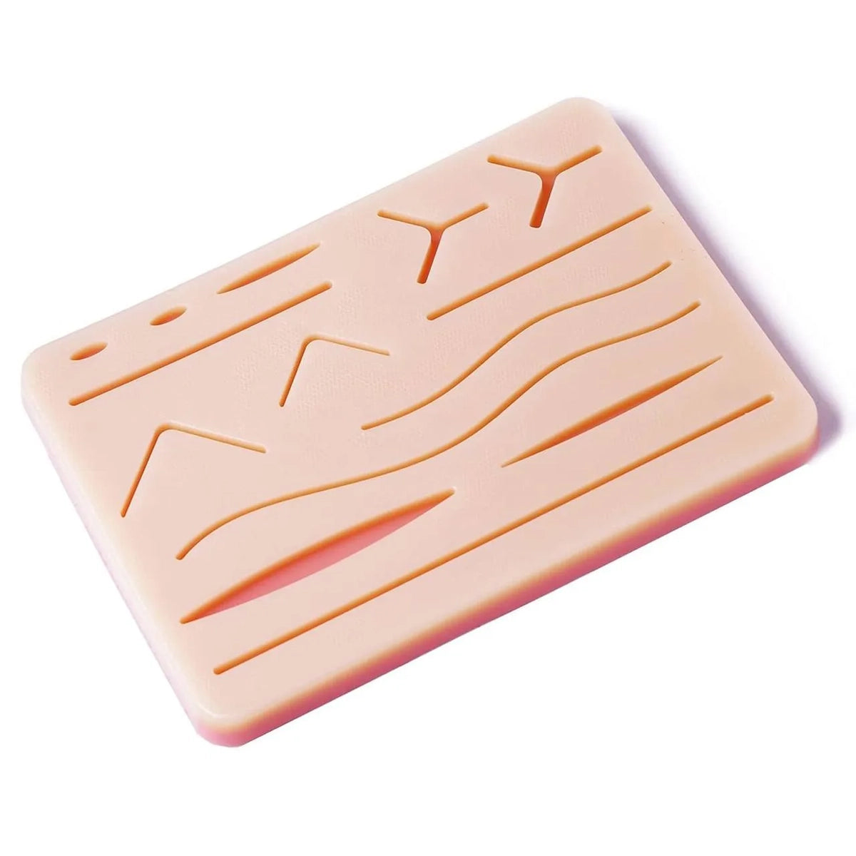 A silicone suture pad with pre-made 14 cuts